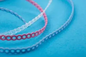 Close,Up.orthodontic,Chain,Or,Elastic,Power,Chain.multi-colored,Ligatures,On,A - Kevin O'Brien's Orthodontic Blog Space closure